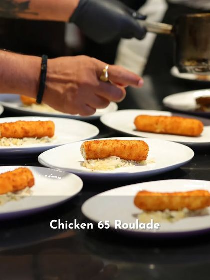 The Chicken 65 Roulade plated and ready to be served. This dish was part of a multi-course experience inspired by the diverse cuisines of India.