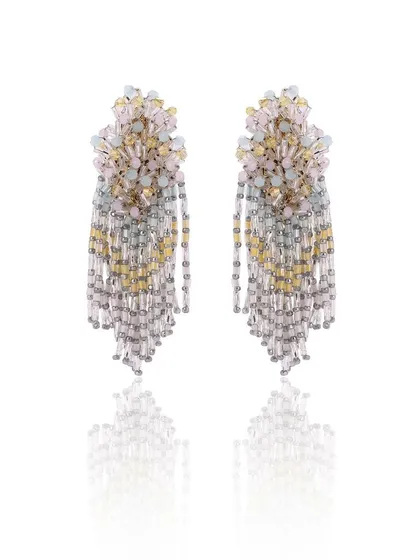 A new drop from our collection, these tassel earrings feature a beautiful gradient of yellow, grey, and pink.