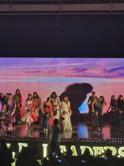 A powerful moment from the grand finale of the school's annual day. We choreographed this segment to be visually stunning, involving a large group of students in a memorable closing act.