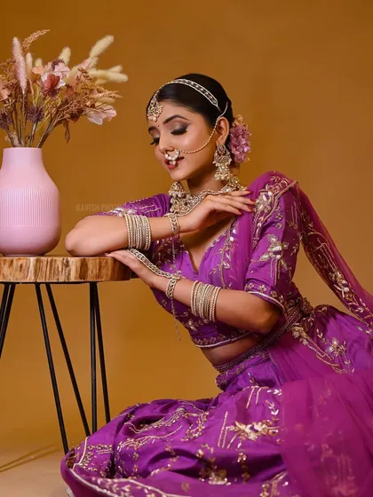 A soft and serene portrait, highlighting the details of the traditional outfit.