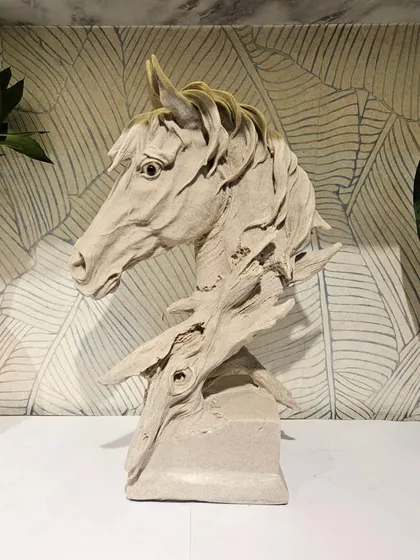 For a more sophisticated gift, I offer premium resin showpieces like this stunning horse bust with a stone finish. It adds a touch of elegance to any home and shows the quality I bring to my decor collection.