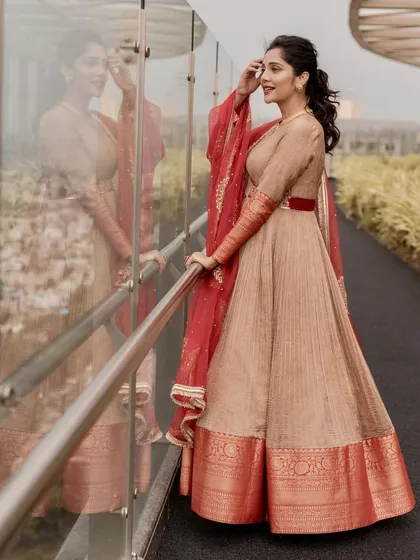 Milana Nagaraj reflects on her style in our elegant beige Anarkali, a perfect blend of subtlety and grace.
