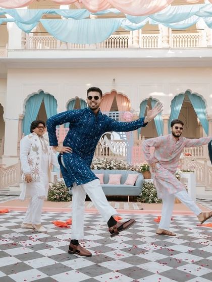 The groom and his squad showing off their moves during a daytime event. The choreography was designed to be fun, easy to learn, and full of energy.
