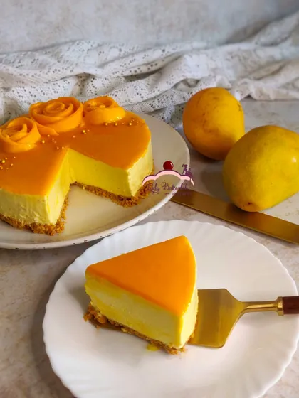 You can almost taste the sunshine in my seasonal mango cheesecake. I use a creamy, rich filling and top it with a vibrant mango glaze and fresh mango rosettes for the perfect summer dessert.