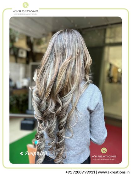 The beauty of expertly blended highlights. This cool-toned blonde and ash brown combination creates a sophisticated look with stunning dimension.