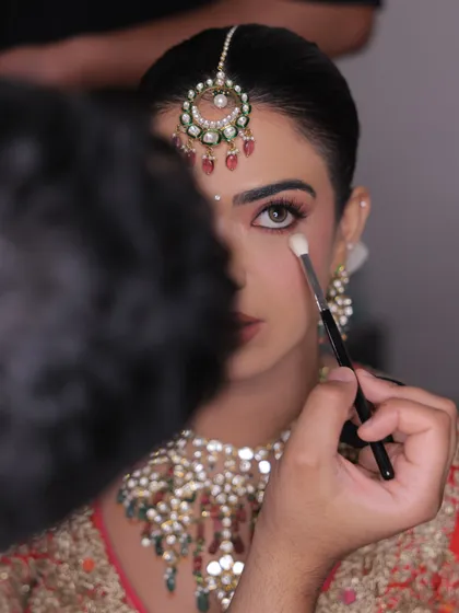A quiet moment amidst the chaos. This is a glimpse into the making of a bride, where I focus on the small details that bring the whole look together. It’s a process built on trust, care, and a shared vision.