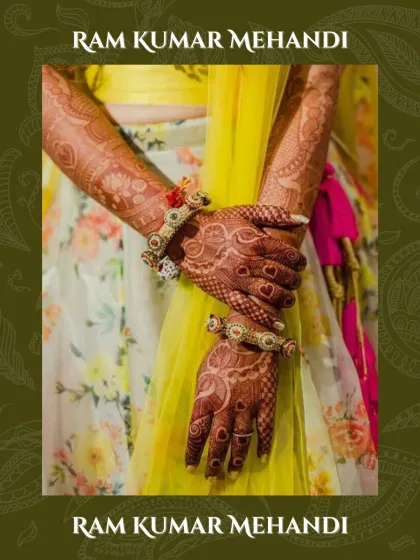 A beautiful, artistic shot of a bride's hands, adorned with mehandi and floral jewelry.
