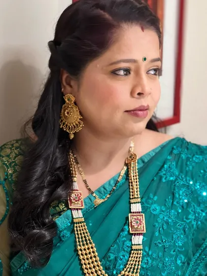 The bride's mami wanted a dewy, natural look, and that's exactly what we did. I kept the eyes very simple with a clean wash of color and focused on creating a radiant, healthy-looking skin finish.