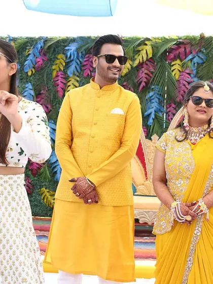 On stage with the happy couple at their Haldi. Even amidst the madness, there are moments to celebrate the bride and groom.