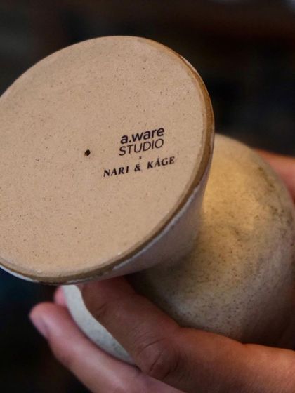 The base of the 'Sanna' goblet, showing the custom stamp for our collaboration. It's a small detail that marks the partnership and craftsmanship.