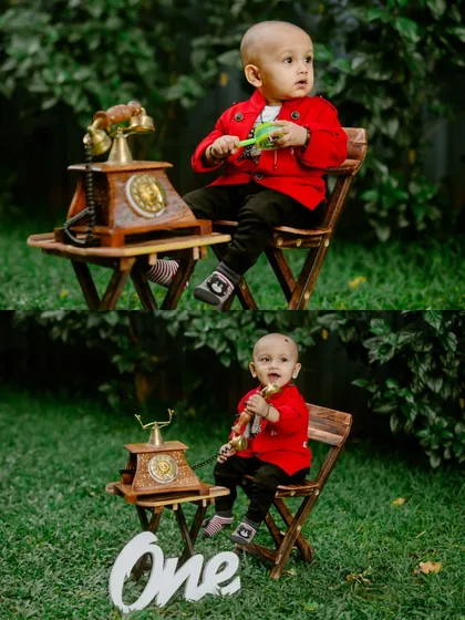 A two-photo set of a baby boy in a bright red jacket, playing with a vintage telephone during his outdoor first birthday shoot.