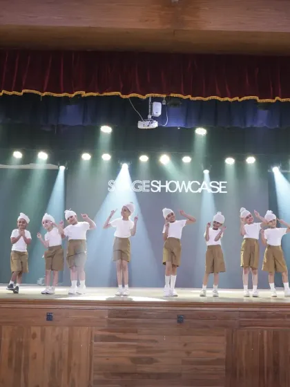 A full view of our toddler group's stage performance. Even at this age, they learn about stage formations and performing as a team.