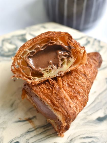 The Xuixo, a Spanish croissant-cronut hybrid filled with rich chocolate cream. This was a sell-out item from our limited-edition Spanish menu.
