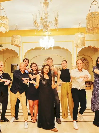 It's all smiles after a successful practice session with this wonderful group from Germany, London, and the USA. I specialize in creating fun, accessible Bollywood dance workshops for international wedding guests, ensuring everyone is ready for the main event.