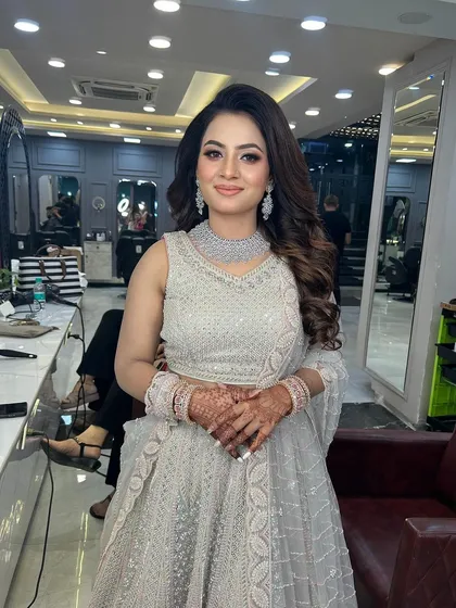 A full-length view of her stunning silver lehenga.