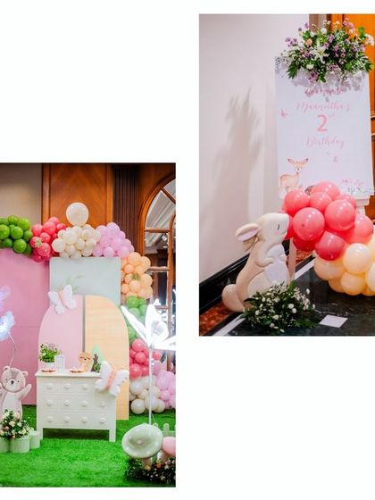 Another view of the woodland party entrance, showing the elegant welcome sign and a cute rabbit prop nestled among balloons.