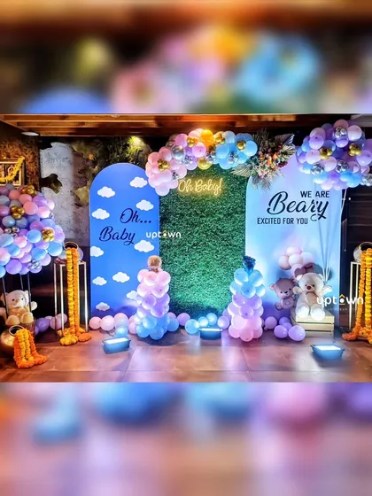 A baby shower is a special milestone, and we design decor to match the joy. This "Oh Baby" themed setup uses a mix of modern backdrops, a lush greenery wall, a neon sign, and creative balloon sculpture's to create a fun and stylish photo corner for the parents-to-be.