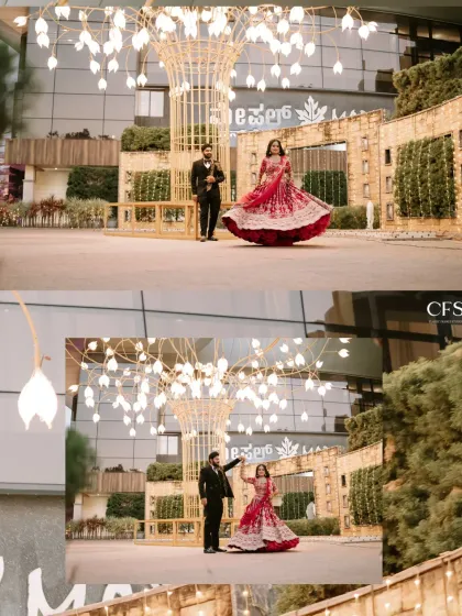 A playful and grand reception shot, with the bride twirling her red lehenga. This image captures the joy and energy of the celebration against a beautifully lit backdrop.