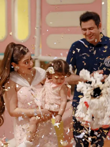 A family's delighted reaction to a magic trick. We love creating moments of shared wonder and laughter for our guests.