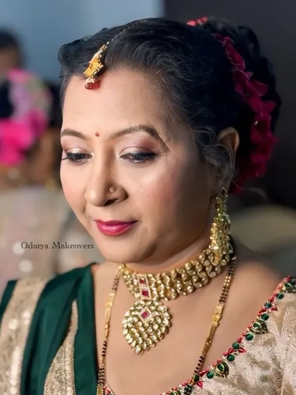 A photo of this mature client in cool ring light. You can see how the makeup looks flawless and the skin is glowing.