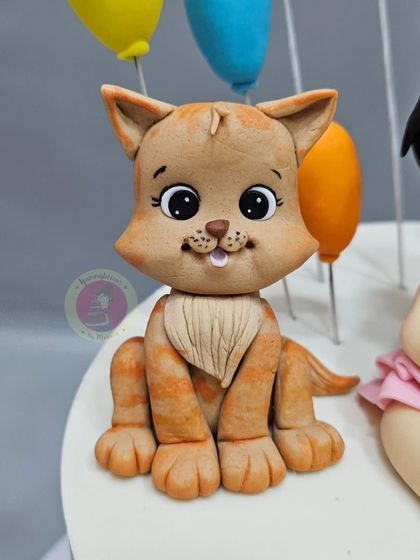 A close-up of the sweet fondant cat figurine from Jahaan's birthday cake.
