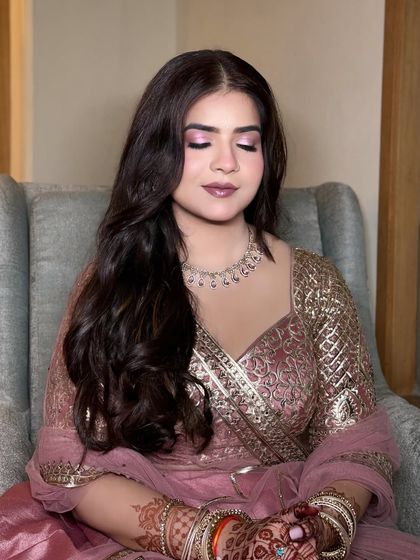 A close-up of the eye makeup. Even with hooded eyes, we can create a beautiful look with soft shimmer and careful blending.