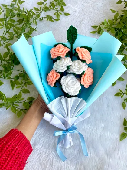 This bouquet is so special to me. A dear customer asked me to create this arrangement of peach and white roses for her mother-in-law, to continue a beautiful tradition her late father-in-law started. It was an honor to craft a gift filled with so much love and memory.