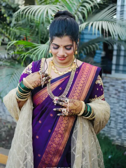 My sweetest bride Priya, who trusted me completely without a trial. Her look features a classic updo, traditional jewellery, and makeup that enhances her natural features.