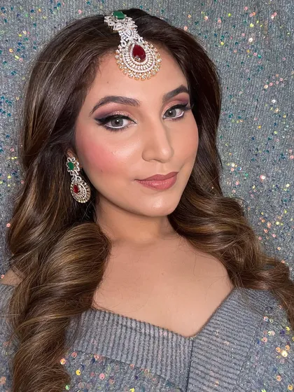 Another angle of the glamorous party look, showcasing the beautiful blend of the eyeshadow and the shine in her hair.