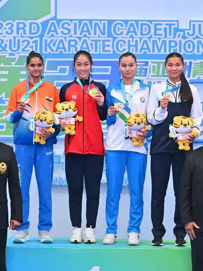 On the podium at the 23rd Asian Cadet, Junior & U21 Karate Championships in Shaoguan, China, awarding medals to the next generation of Asian champions.