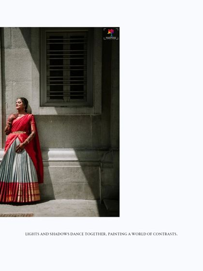 A beautiful play of light and shadow in this bridal portrait. The bride, in her traditional attire, is illuminated by sunlight, creating a dramatic and artistic image.