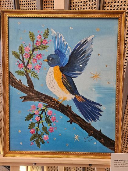 A beautiful painting of a bluebird on a branch with pink blossoms, from the 'Art Soirée' collection.
