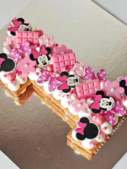 Another angle of the Minnie Mouse number tart, showing the layers of the butter tart and the rich chocolate mousse filling.