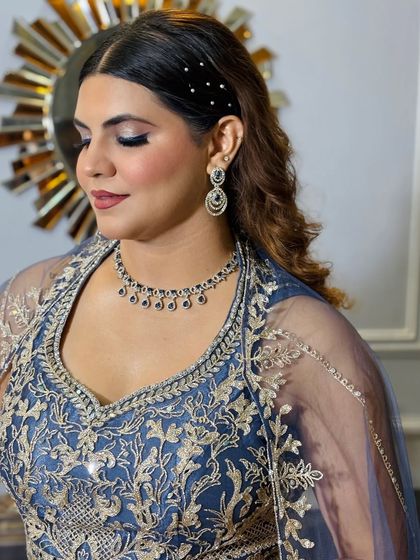 Another beautiful side profile, perfect for showing off both the makeup and the hairstyle.