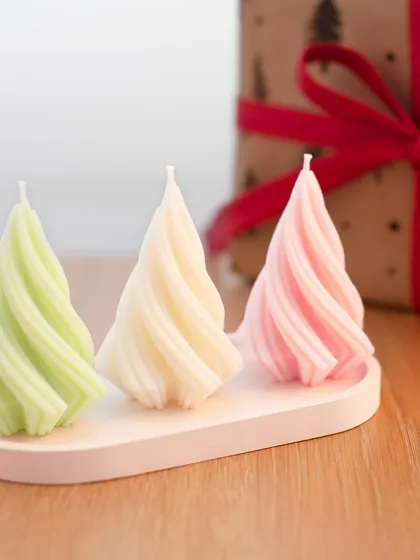 These spiral Christmas tree candles are a festive and modern design. They look wonderful as a set and are a great product to sell during the holiday season.