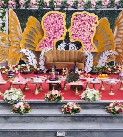 A closer, straight-on view of the beautiful butterfly-themed engagement stage.