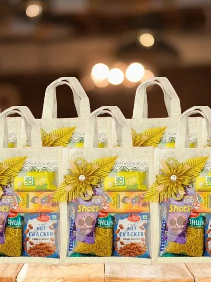 A row of jute bag hampers delivered for a wedding. These are a great option for eco-friendly and stylish return gifts.