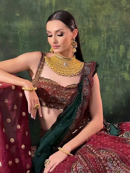 A beautiful final portrait from the jewelry campaign. The makeup is soft yet defined, designed to enhance the model's natural beauty while allowing the stunning gold jewelry to be the star of the show.