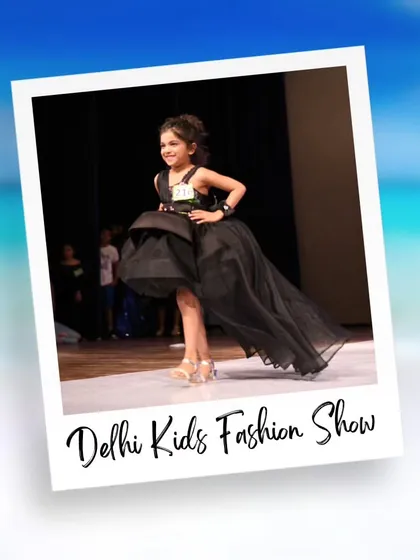 A smile and a confident walk make this dramatic black high-low gown even more stunning. I love seeing the joy on the kids' faces as they own the stage.