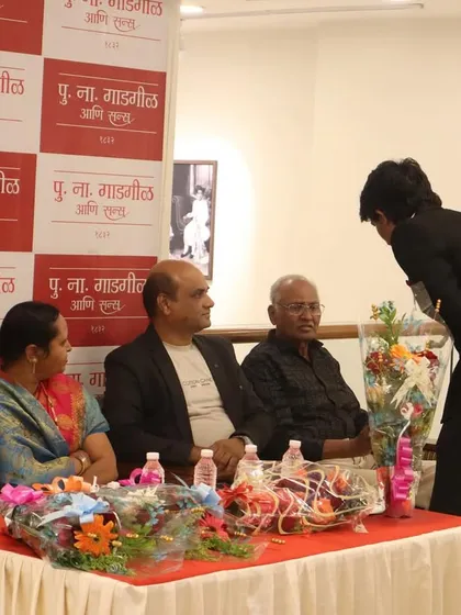 A young artist paying his respects on stage during the inauguration ceremony. It is heartening to see such respect for art and artists from the younger generation.