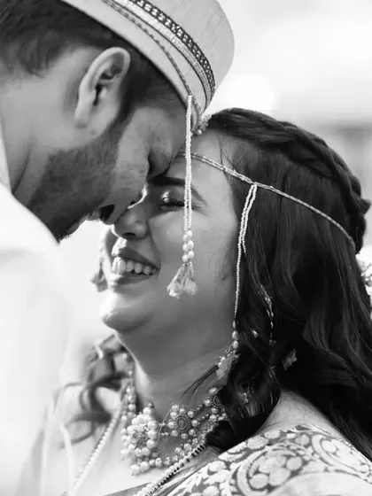 The beautiful, overwhelming joy right after the ceremony. This intimate black and white portrait focuses on the emotional connection and happiness, a core part of my wedding storytelling photography.