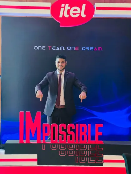 At the Itel corporate show, standing by their "I'M POSSIBLE" tagline. My job is to prove that what seems impossible is, in fact, possible.