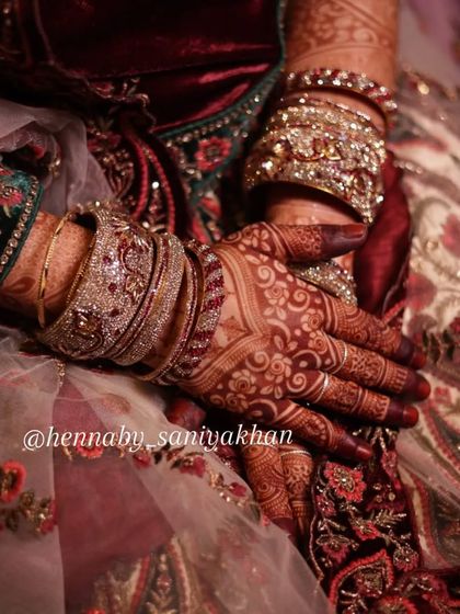 Another shot of the beautiful bridal stain, adorned with sparkling bangles. This is the picture-perfect result I aim for with every bride.