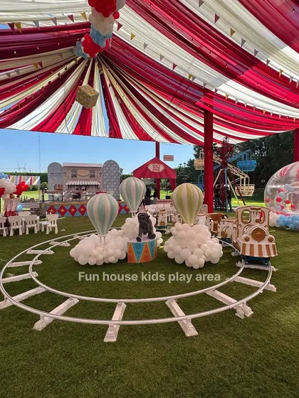 We do more than just bounce houses. We can create a complete carnival-themed adventure for your event, featuring our kids' train ride, themed decorations, and multiple play stations for a truly memorable celebration.