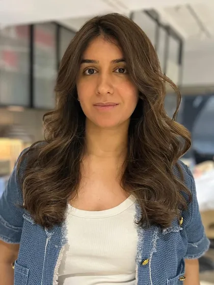 A complete hair color transformation using a classic highlight technique. The result is fresh, vibrant, and full of life.