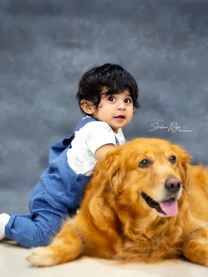 A boy and his best friend. Including pets in photoshoots is always a great idea, and this portrait of a baby with his gentle Golden Retriever is absolutely adorable.