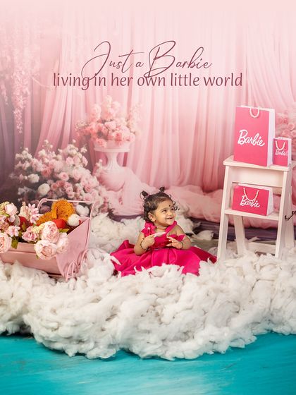 Just a Barbie living in her own little world. Another take on our popular Barbie theme, with a beautiful pink dress and a dreamy cloud setting.