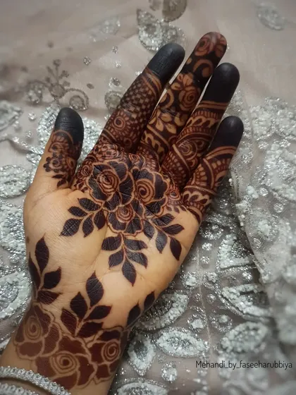 The matured stain of my organic henna cones is deep, dark, and beautiful. This photo shows a bold floral design with a stunning result.