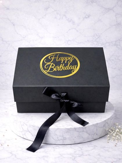 A classic and elegant birthday gift box. This simple black box with a "Happy Birthday" message is perfect for any theme and can be filled with a custom selection of gifts.