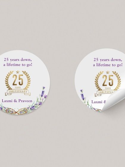 A pair of elegant 25th-anniversary stickers, showcasing the beautiful lilac and gold design. These small details help create a cohesive and memorable theme for any milestone celebration.